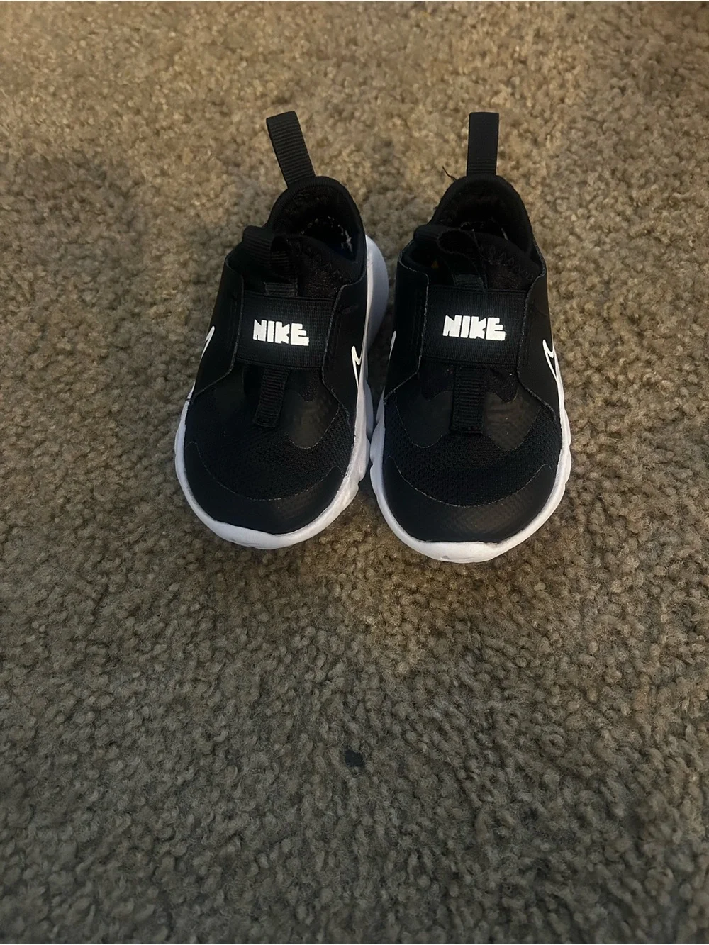 Nike Black and White Kids Slip-On Athletic Sneakers